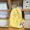 School bags, female college students, simple solid colors, love, junior high student, niche and versatile girls, high school student backpacks, trends