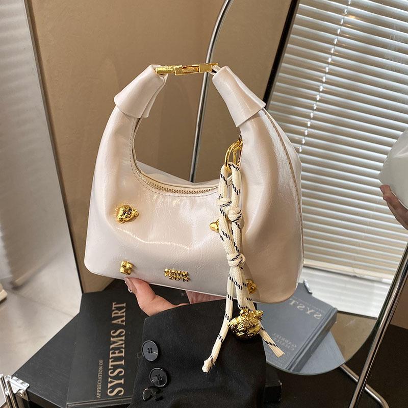 Frühling neue Mode Damen Tasche vielseitige Schulter Umhängetasche High-End Gefühl tragbare Knödeltasche Damen