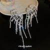 Silver needle with diamond wings hollow fringed earrings European and American exaggerated earrings temperament light luxury earrings women