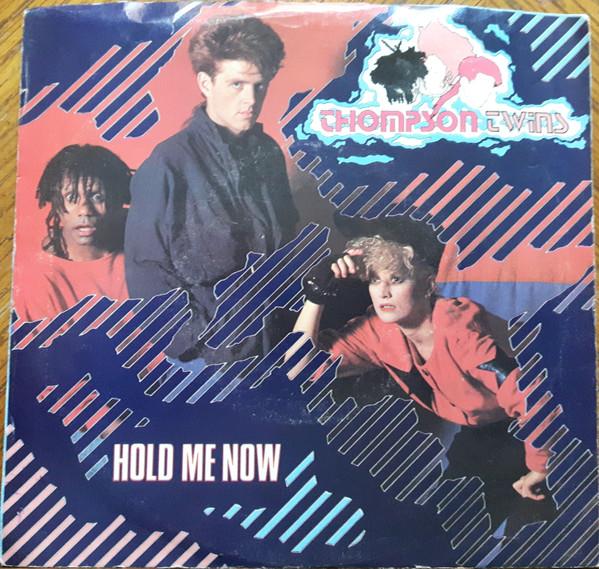 

7inch Record THOMPSON TWINS - Hold Me Now AS19164 ARISTA 1983 Canada Dance & Electronica Used