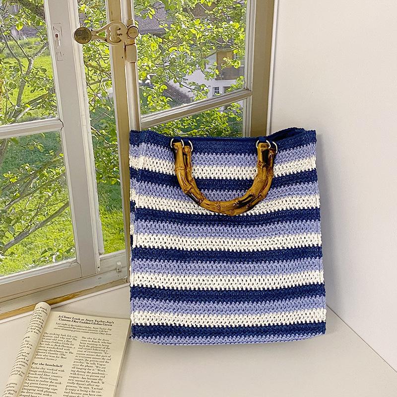 

Large capacity tote bag women s new lazy wind striped handbag woven casual bag синий