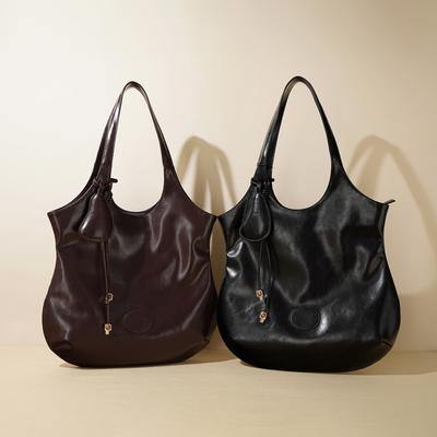 Neue Umhängetasche Rindsleder High-End Mode Schrägtasche Damen Großraum Vielseitig Pendler Eimertasche