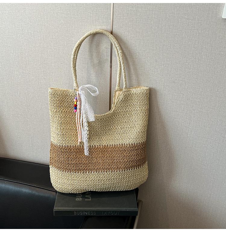 

Женские соломенные плетеные сумки большой вместимости, новая весенняя повседневная на плечо, портативная, нишевого дизайна, сумка-тоут бежевый