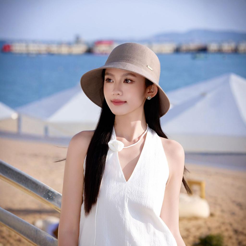 Spring and summer noble French elegant coffee milk shredded bucket hat new art plain temperament versatile straw hat