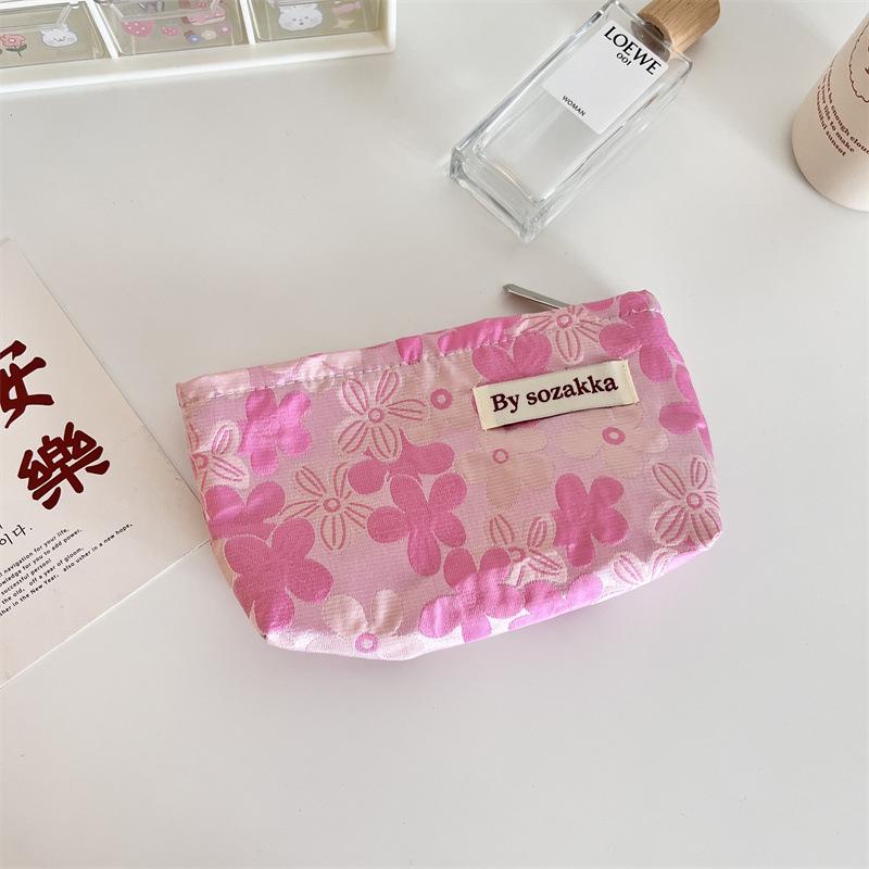 Trendy Ladies Simple And Portable Floral Embossed Cosmetic Bag For Use Everyday