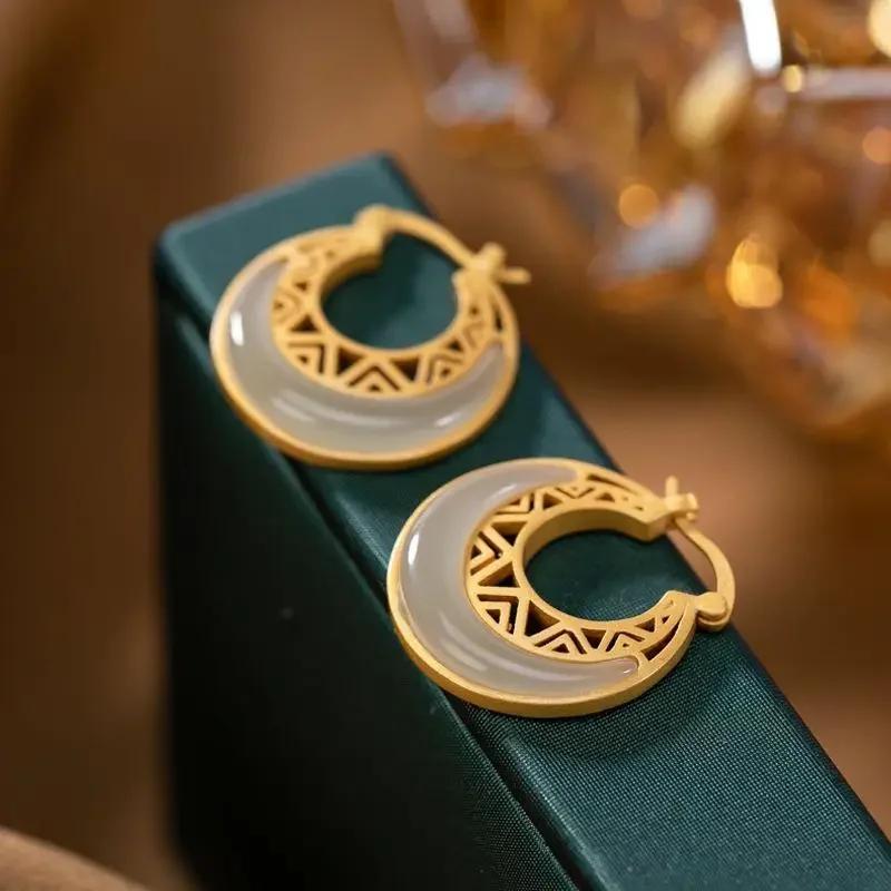 

Дизайнерские оригинальные новые серьги-полумесяцы из полого нефрита Хэтянь, выполненные в старинной технике золочения, простые и щедрые, циркон