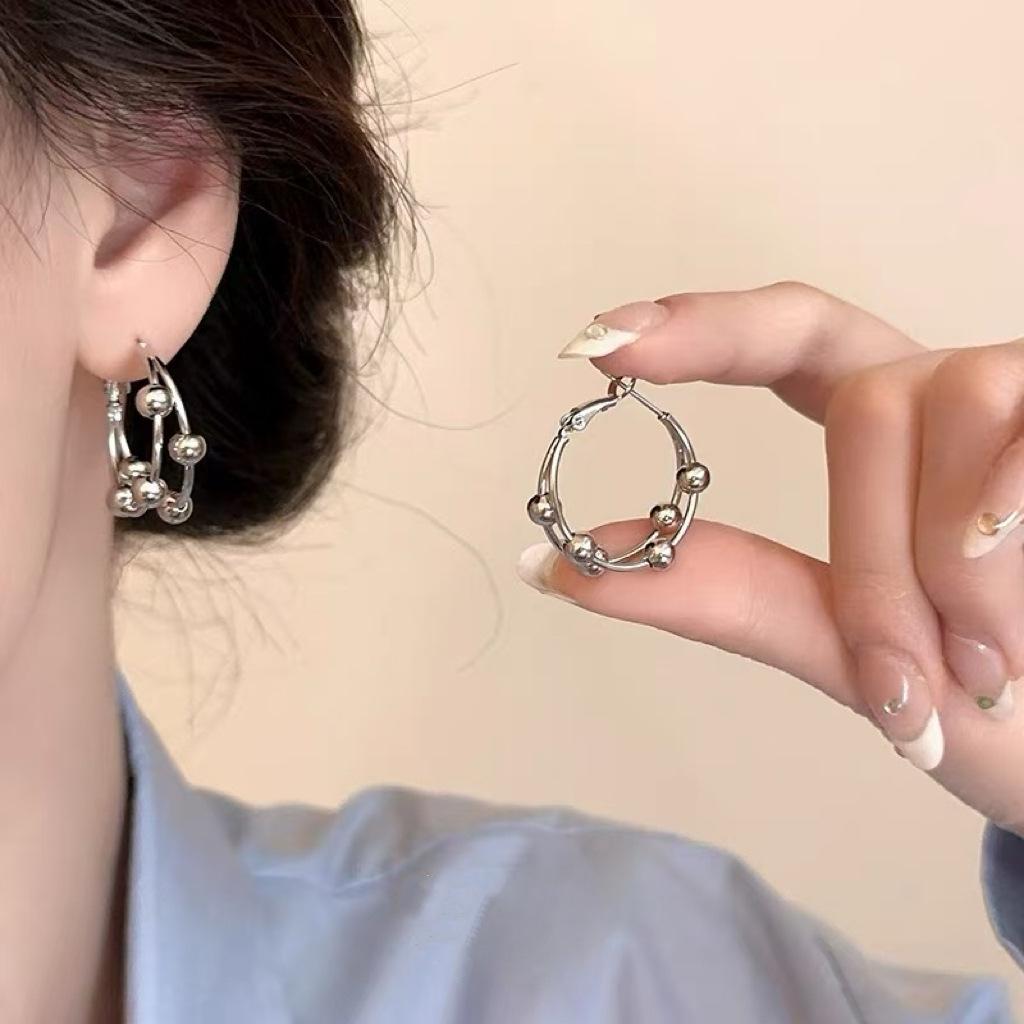 Women's Luxury Textured Metal Hoop Earrings - Versatile Niche Design