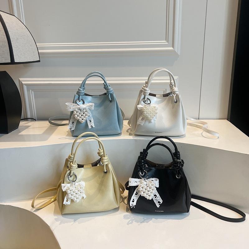 2025 New Bow Bag Pendant Bag Summer Versatile Shoulder Bag Premium Oblique Span Bag Fashion Handheld Women's Bag