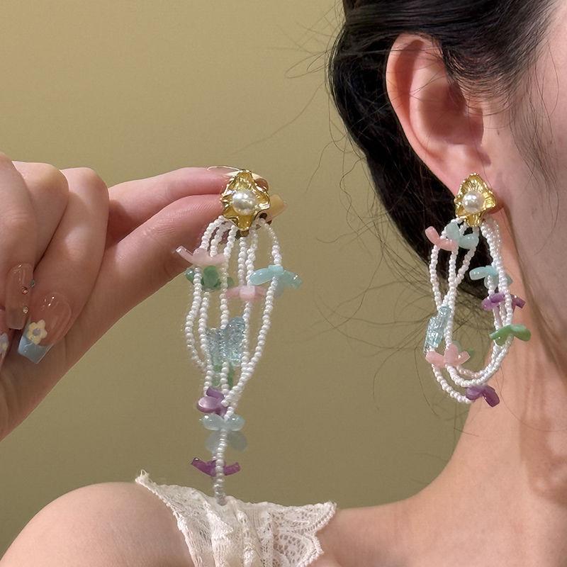

Pearl butterfly flower fringed earrings light luxury niche design fashion stud earrings high sense versatile earrings women