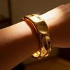 Elegant European-American Irregular Smooth Gold Alloy Bracelet