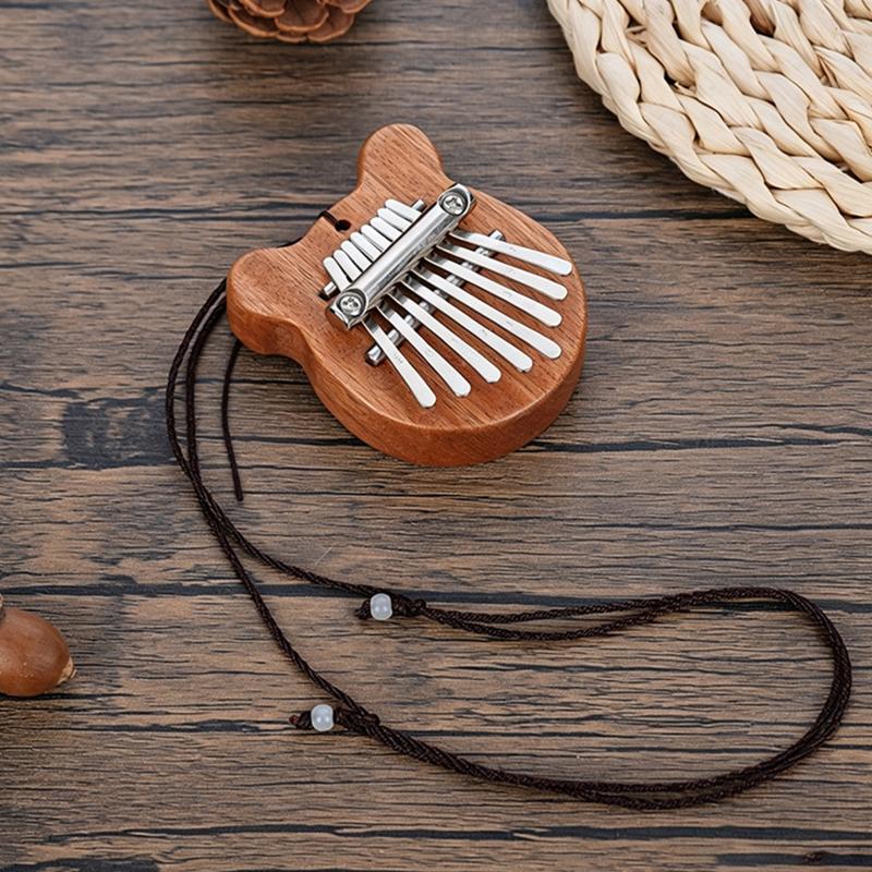 Mini 8 Key Solid Wood Kalimba With Portable Lanyard And Crisp Sound Perfect For Music Beginners Kids Casual Play Travel Gift