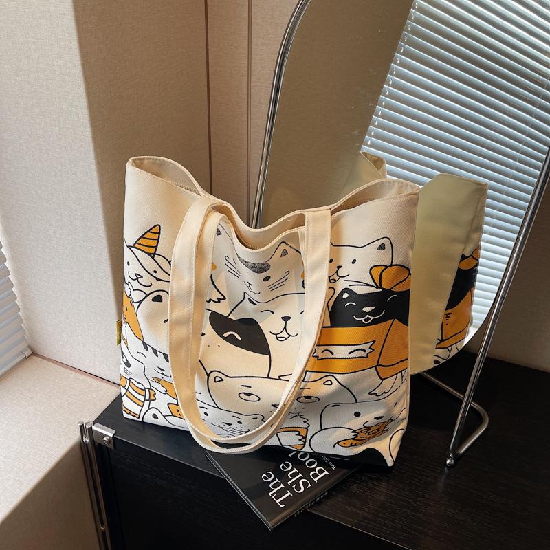 Casual Cartoon Large-capacity Canvas Bag Women's New Fashion Shoulder Bag Versatile Class Commuter Bag