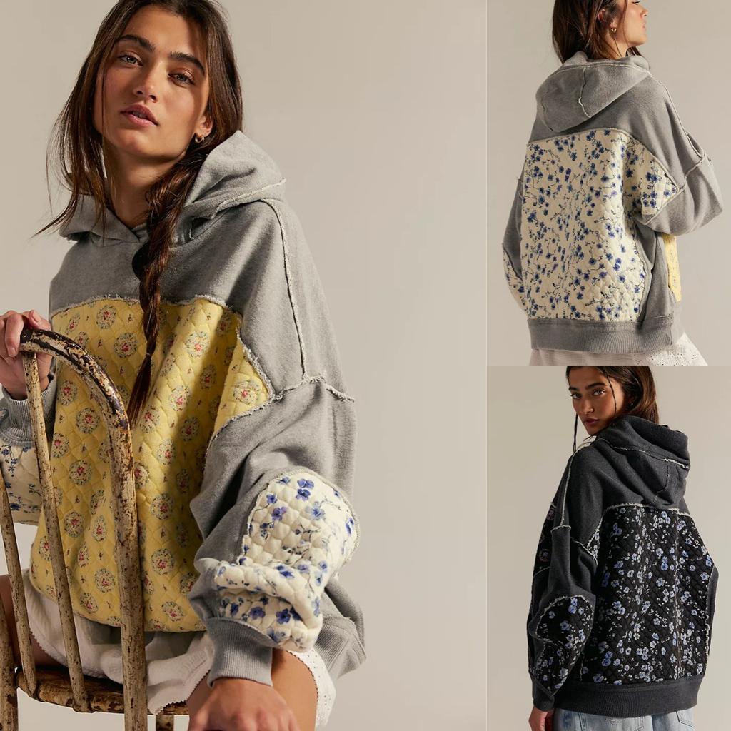 Graues Kapuzensweatshirt mit gelbem Kontrast und floraler Applikation