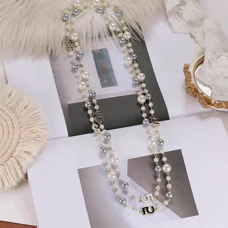 Elegant Pearl Four-Leaf Clover Women's Necklace - Versatile Layered Sweater Chain for Autumn/Winter