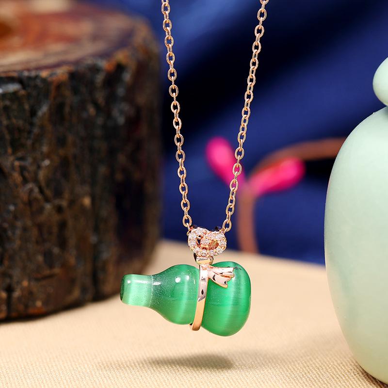 Chinese style imitation Hetian jade safety buckle necklace women's retro temperament titanium steel clavicle chain gold inlaid jade pendant with