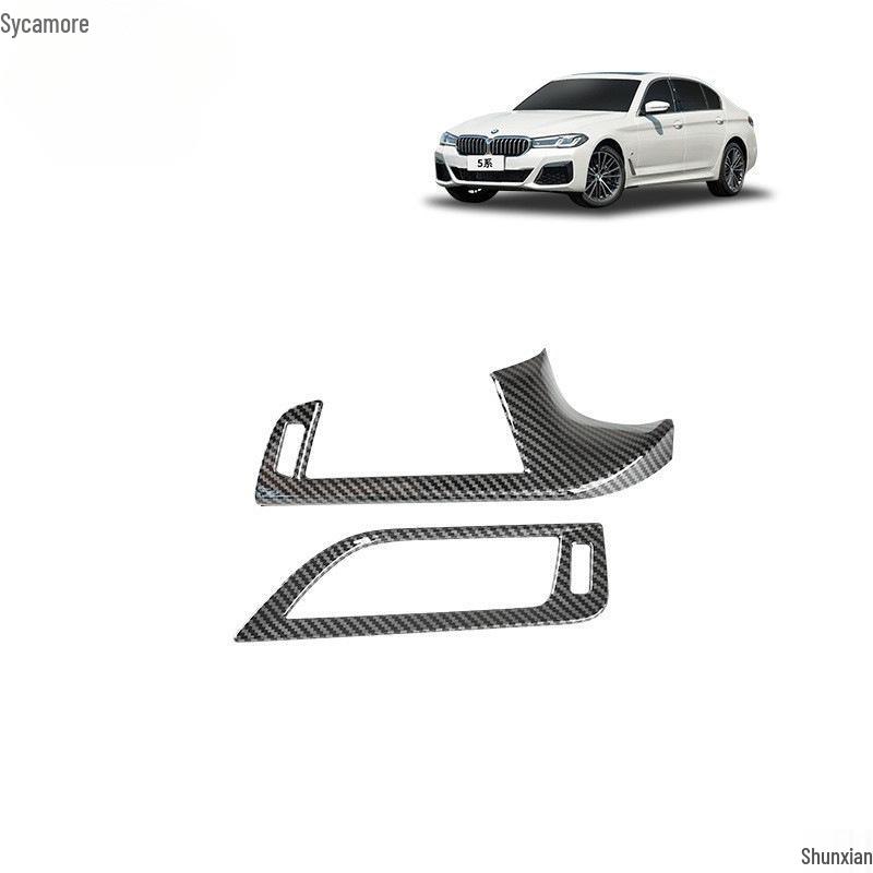Carbon Fiber Interior Trim Set for BMW 5 Series: Center Console, Gear Shift, Multimedia Lift Panel, and Air Vents.