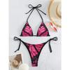 Dámský dvoudílný bikiny set se zeleným potiskem motýlích křídel. Trojúhelníkový top s halter krkem a kalhotky s bočními šňůrkami.