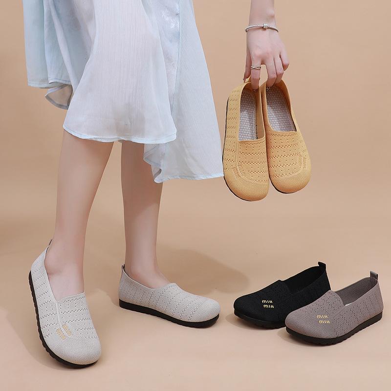 Shoes women's summer new flying woven mother shoes fashionable breathable flat shoes soft sole versatile hollow single shoes
