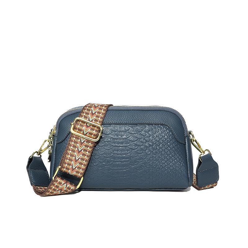 

Leather women s bags new trendy fashion simple niche shoulder messenger bag first layer cowhide bag синій