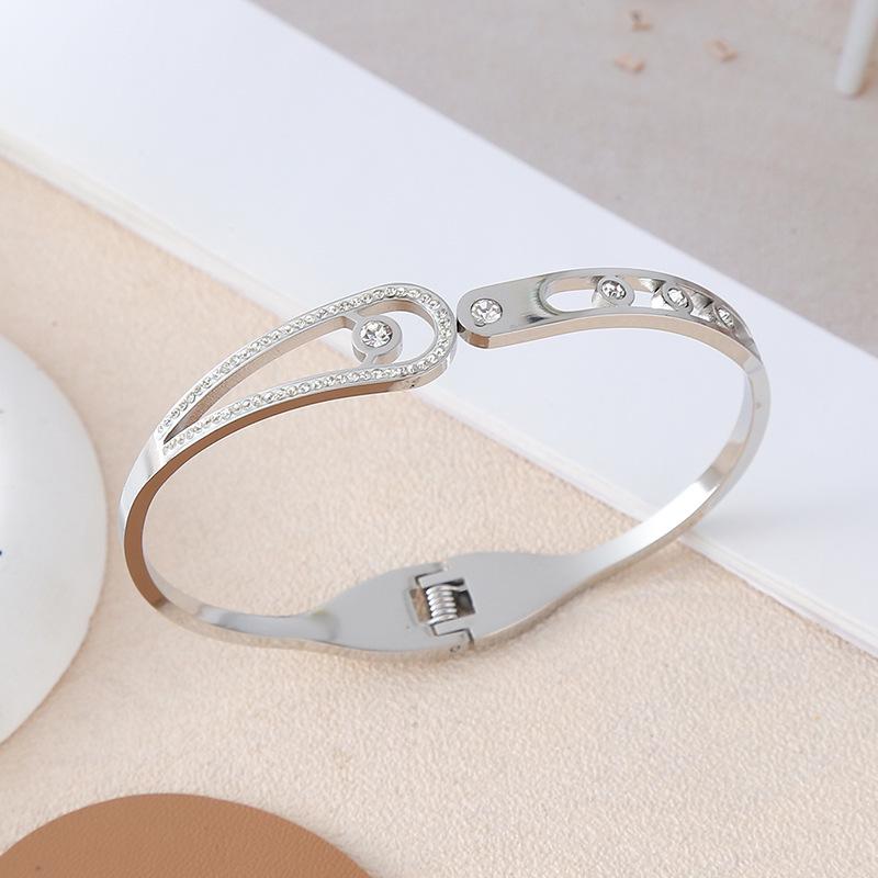 European-American Bestseller: Water Drop Rhinestone Titanium Steel Bracelet - Lightweight Spring Clasp Luxury Design