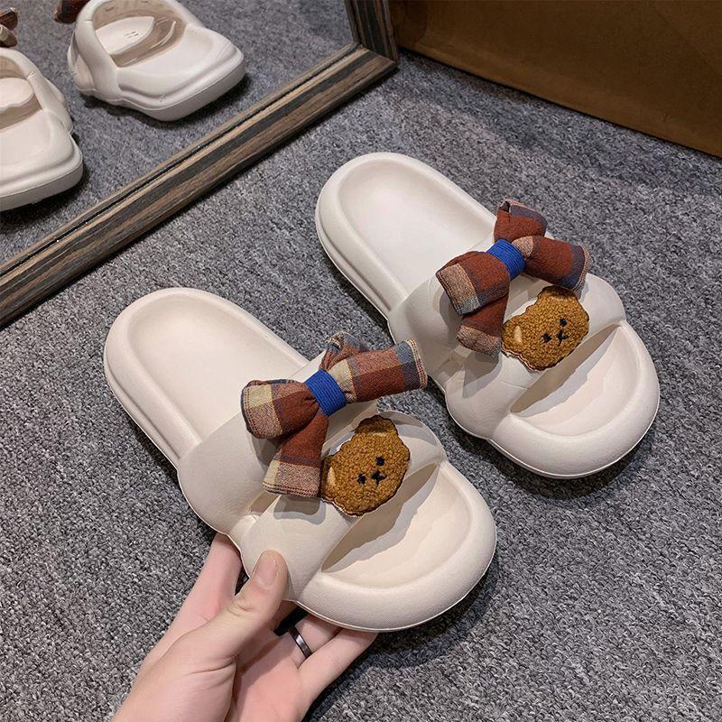 Cute bow one-word slippers for women 2025 new girl heart flat bottom stepping on shit feeling versatile home half slippers for women