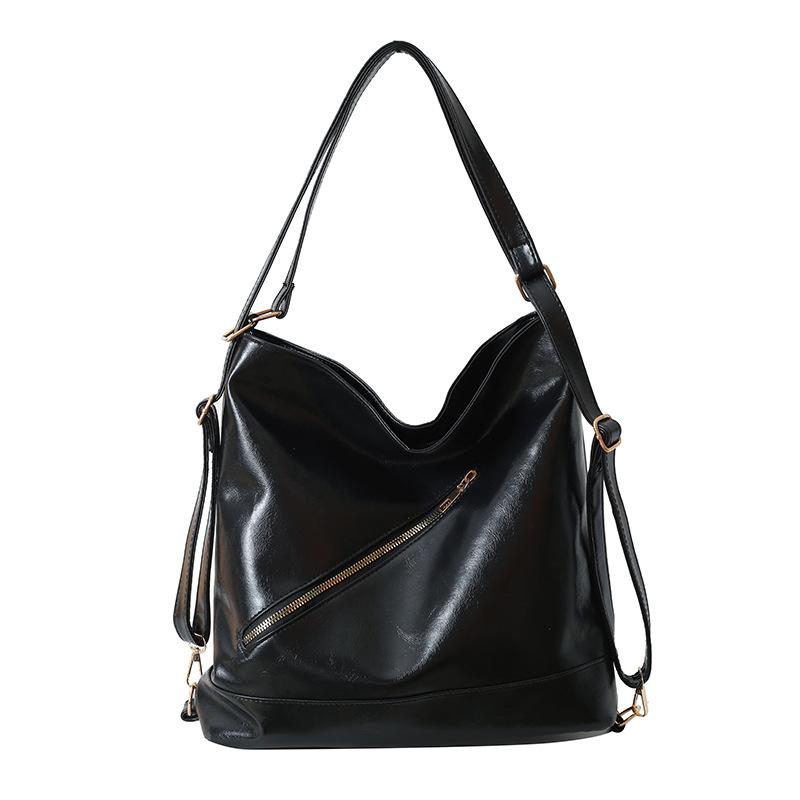 

2024 новая сумка для поездок на работу большой вместимости, текстура мягкой кожи PU, маленький рюкзак, нишевый дизайн, одно плечо, косая сумка чёрный