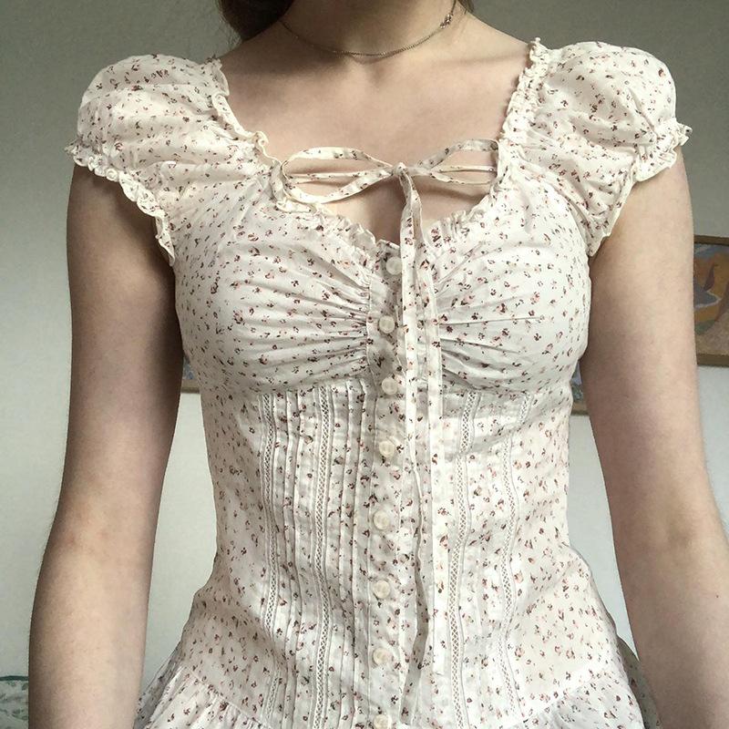 

French floral shirt women s summer new product straps hollow bubble sleeve T-shirt button cardigan S