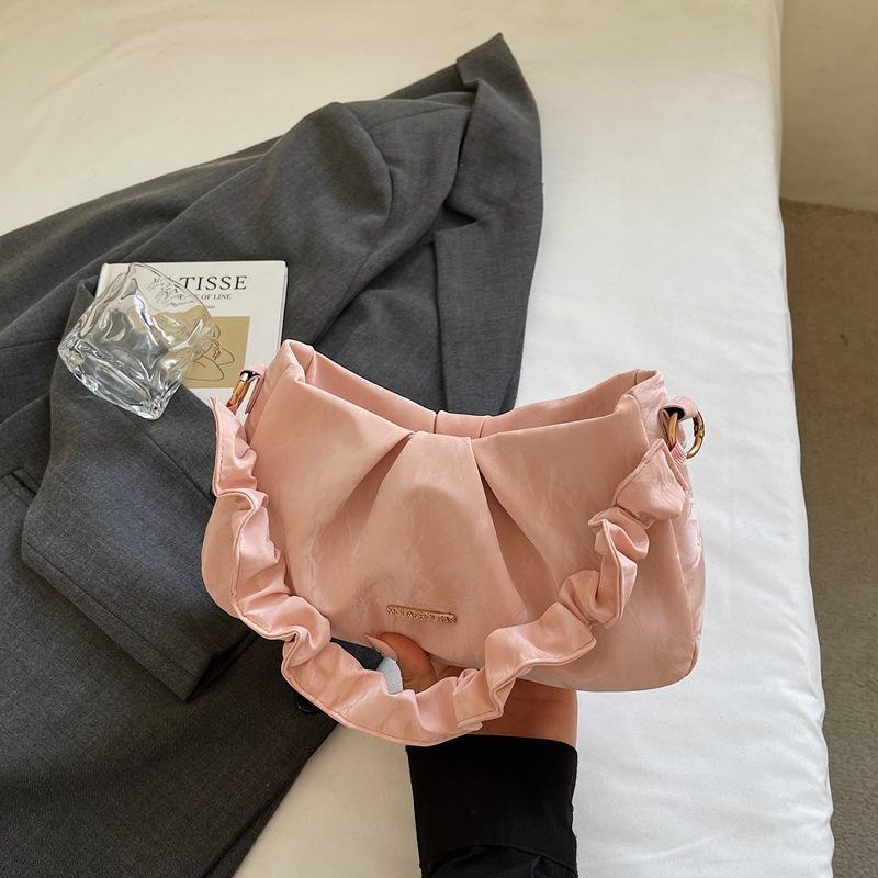 

Сумка женская 2025 Новая популярная сумка под мышкой Премиальное ощущение Облачная текстура Нишевая Одноплечевая Складки Сумка через плечо розовый