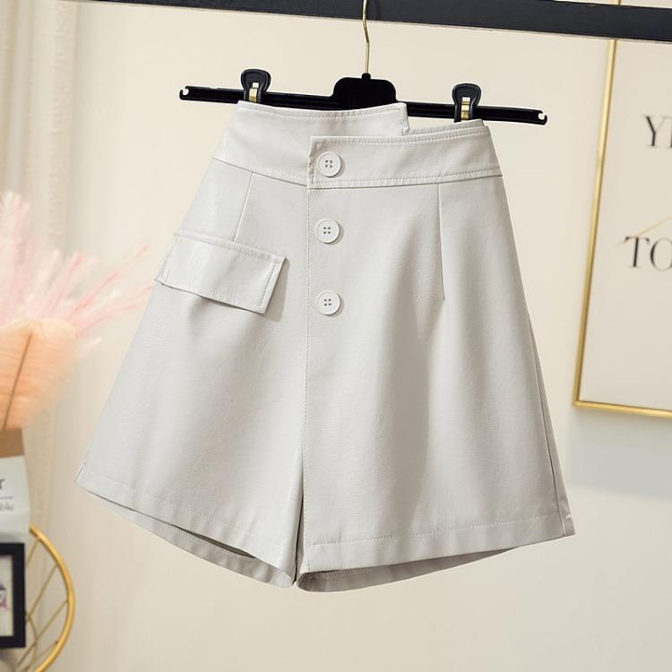 Módní nepravidelná krátká sukně z PU kůže s vysokým pasem pro ženy A-line