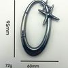 Högkvalitativ Metallstjärna Oval Nyckelring: Nischdesign Väskberlock & Klädtillbehör