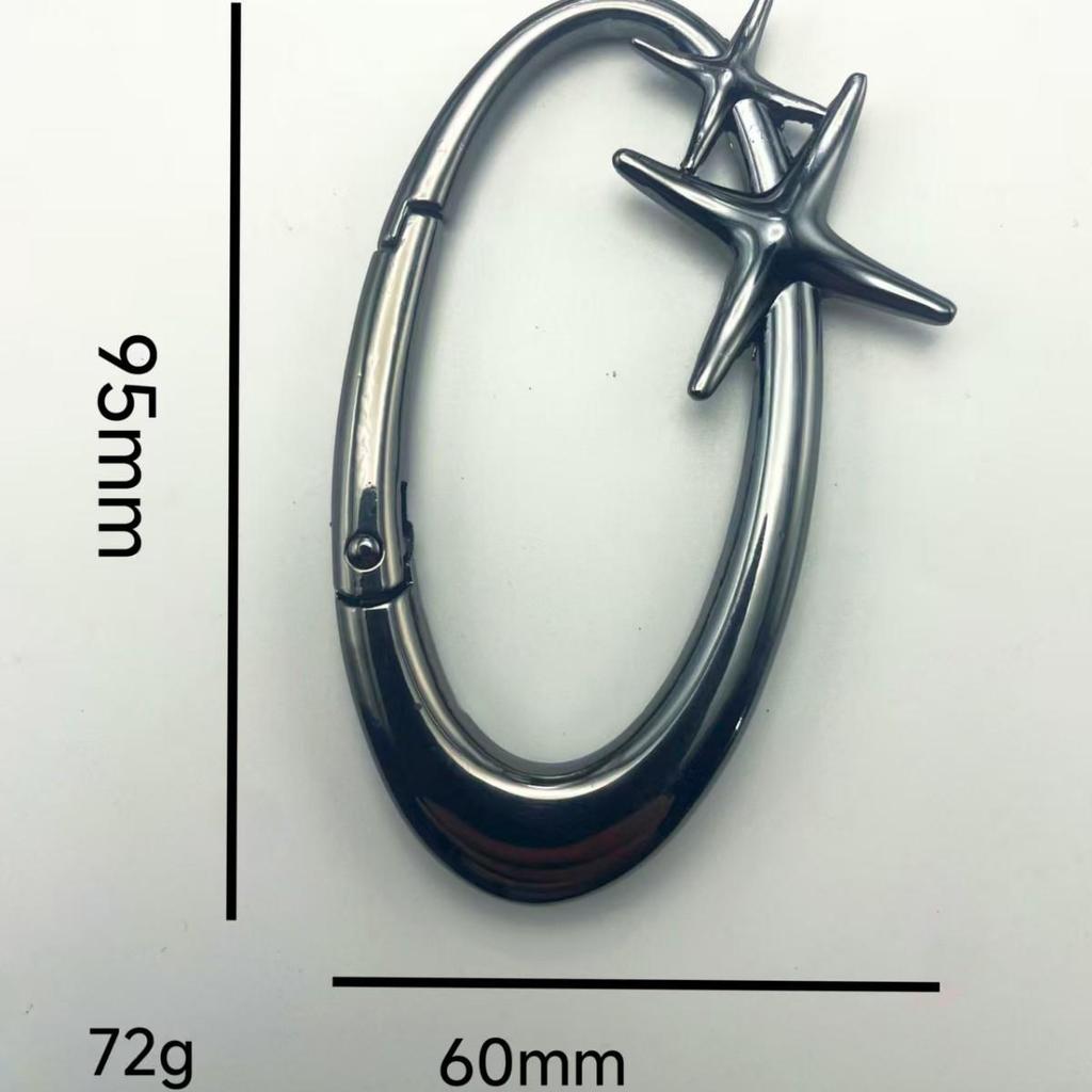 Högkvalitativ Metallstjärna Oval Nyckelring: Nischdesign Väskberlock & Klädtillbehör