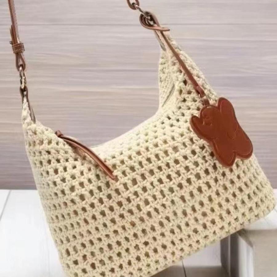 Spring and summer new small bag messenger bag new niche high-end woven bag seaside portable shoulder bag women