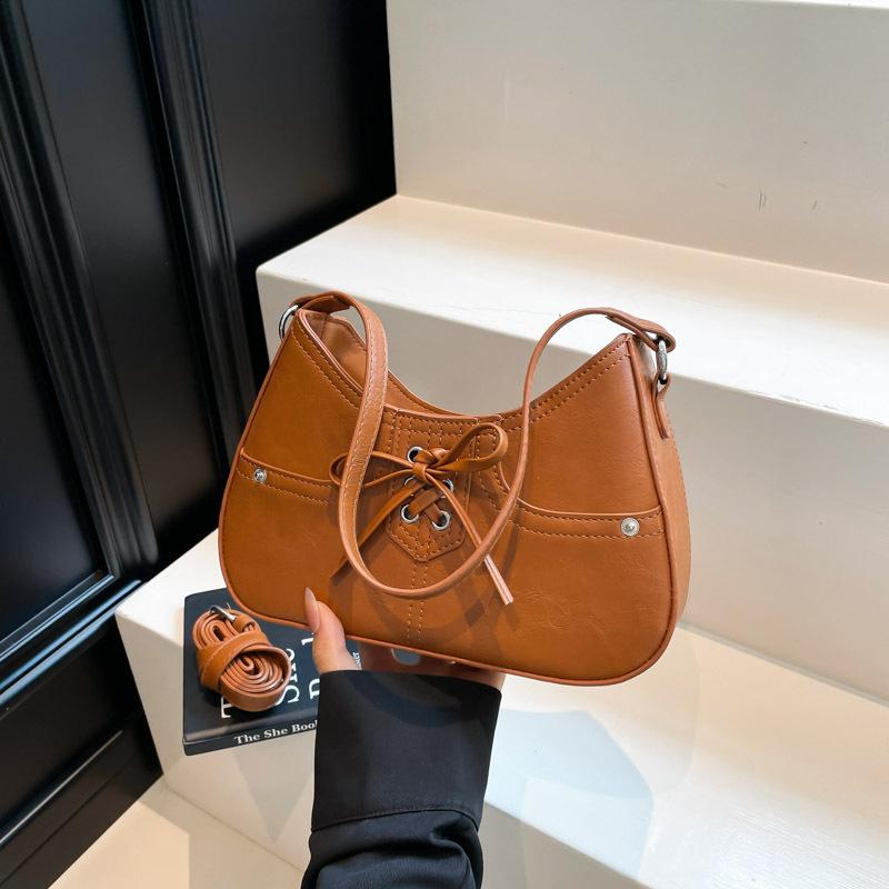 

Личность трендовая мода бант сумка подмышку женская новая текстура плечо сумка багет для поездок коричневый