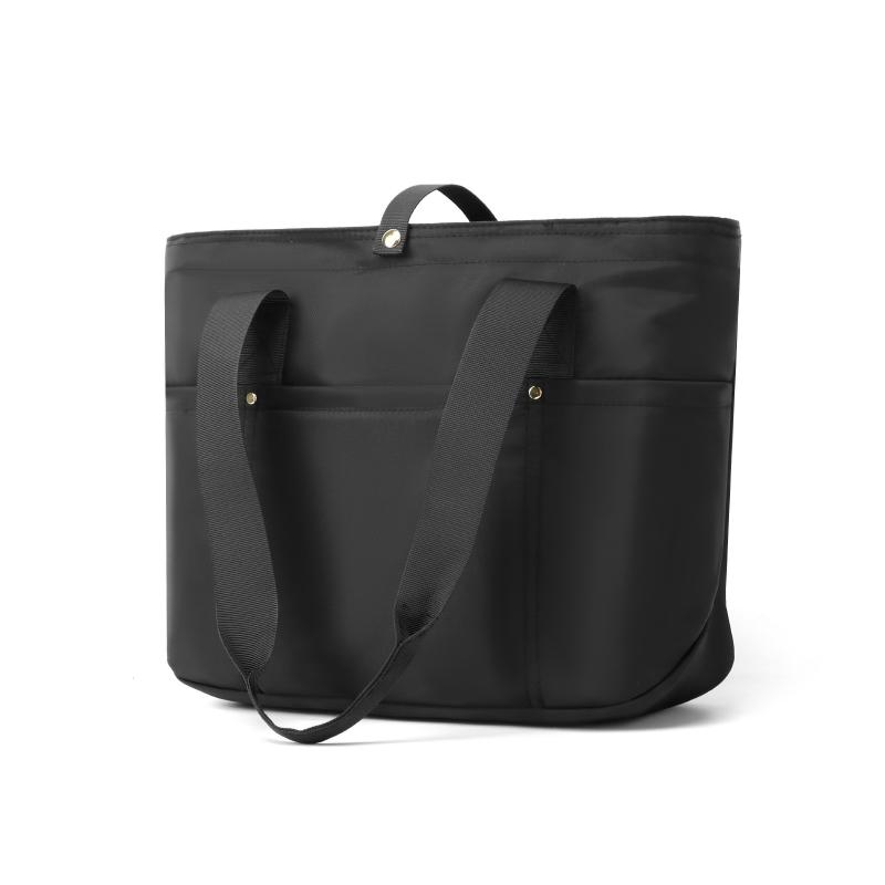 Women's portable folding storage bag with multiple compartments and adjustable shoulder strap for large capacity.