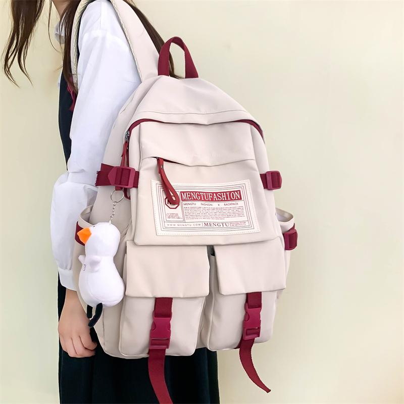 

School bag for female junior high school students Large capacity school bag New boys and girls High school students Couple backpack білий