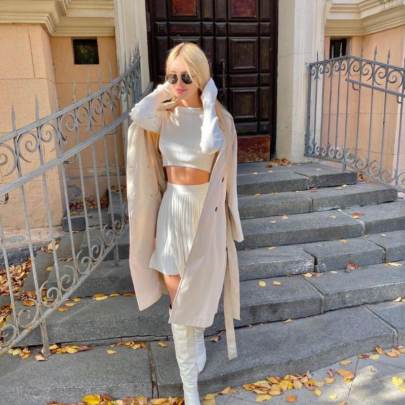 RUGOD New Women's Fashion Long Sleeve Corset Pleated Mini Skirt Short Skirt Women's Knitted Sweater Two Piece Set