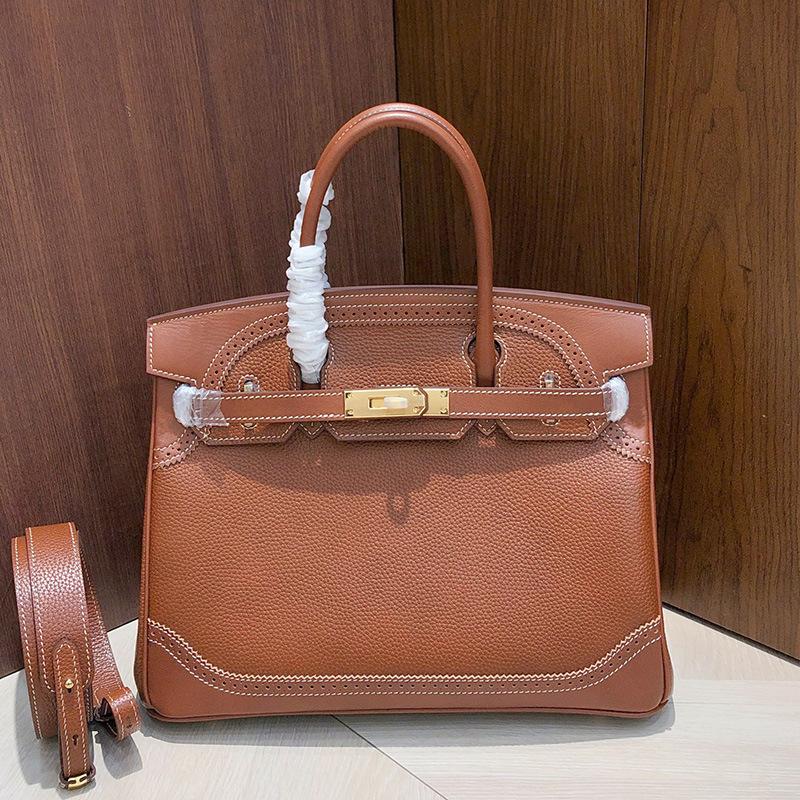 

Версія haute couture Європейський та американський ретро ручної роботи шкіряна вставка мереживо платинова сумка шкіряна сумка через плече сумка-месенджер жіноча 25*13*20cm