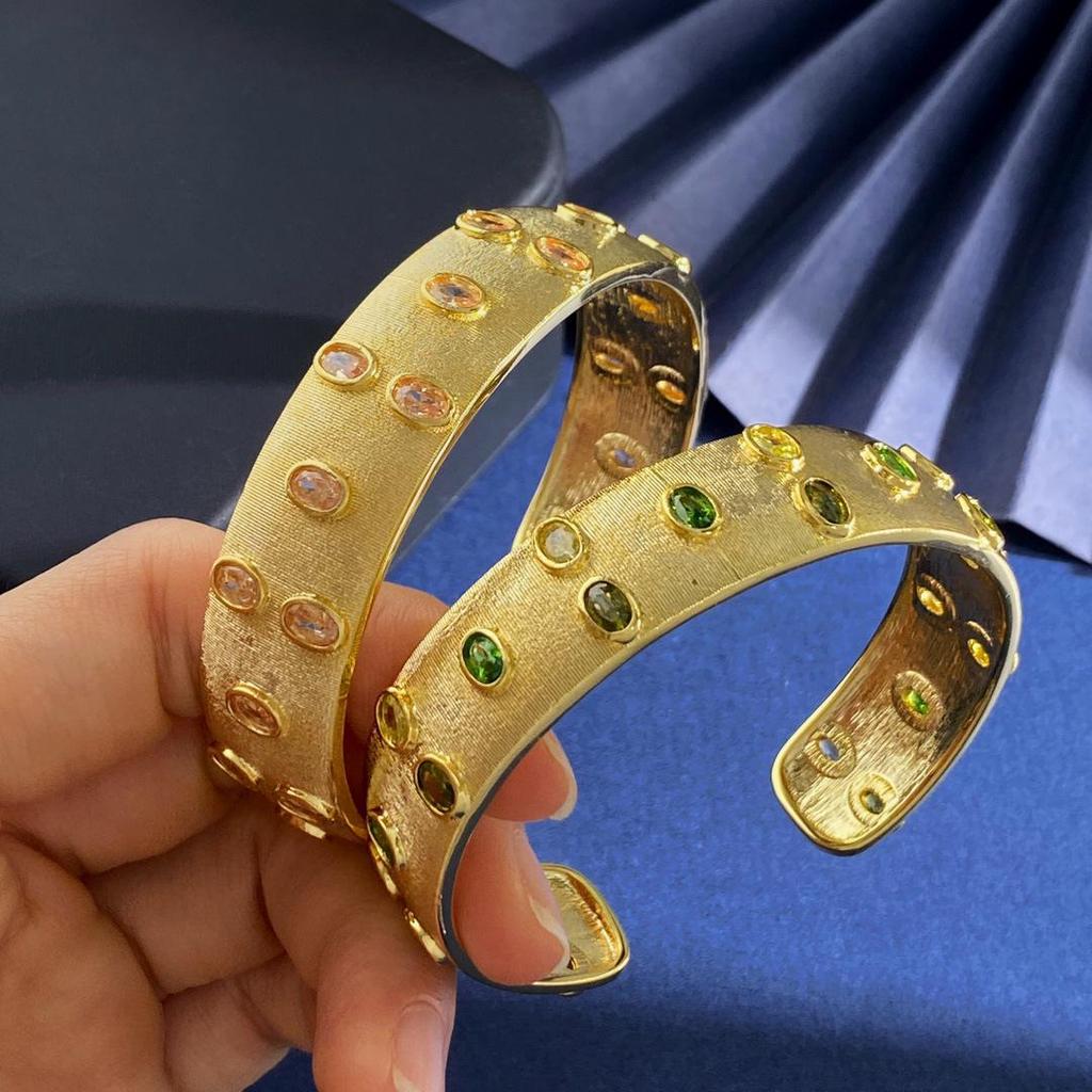 Brushed Gold-Plated C-Shaped Bracelet with Oval Gem
