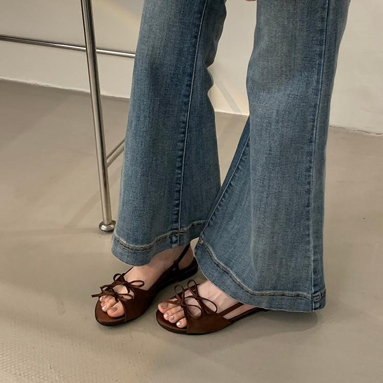 Beautiful Flat-soled Sandals Women's Summer Wear 2025 New Fairy Bow Temperament High-end Fashion Roman Women's Shoes