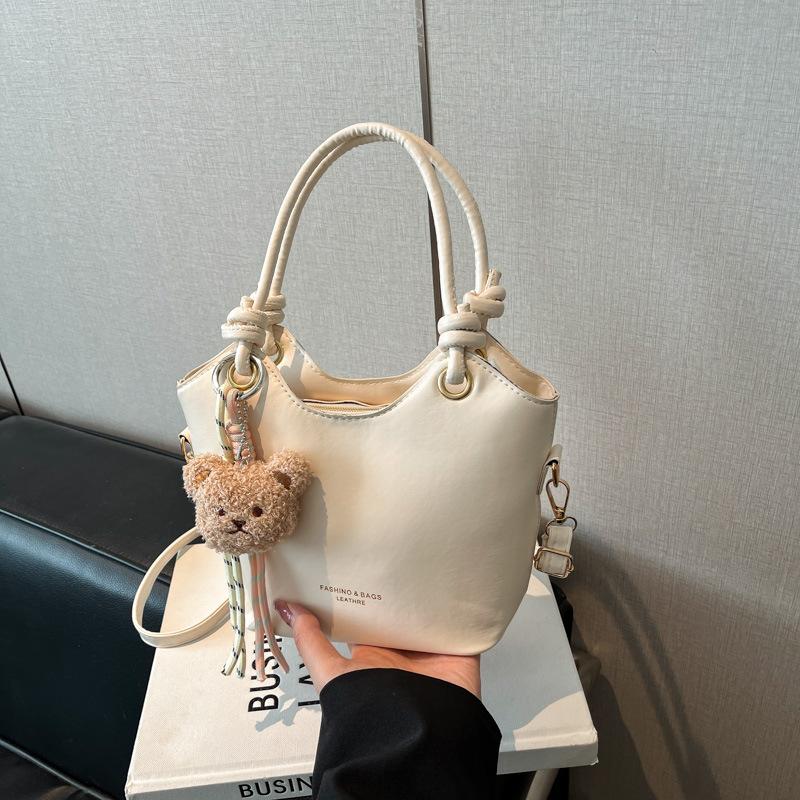 

Korean version of the commuter portable small bag for women s 2025 spring new high-end niche versatile shoulder bucket bag Without pendant білий