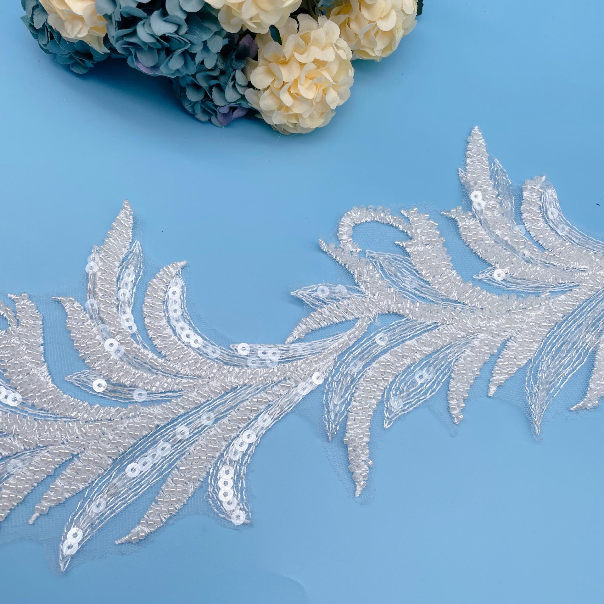 

Тяжелая промышленность Листья Бисер Пайетки Вышивка Ручная работа Кружево Листья Аксессуары Сделай сам Свадебное платье Пояс Головной убор Украшение White (about 14CM wide)