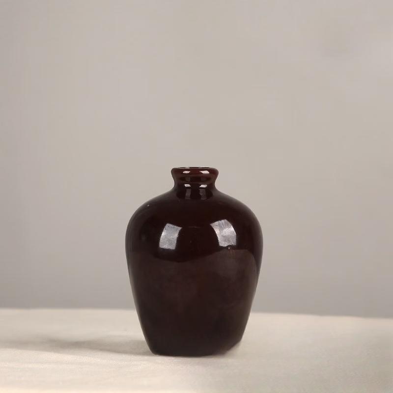 

Red Glazed Ceramic Liquor Bottle with Cork
