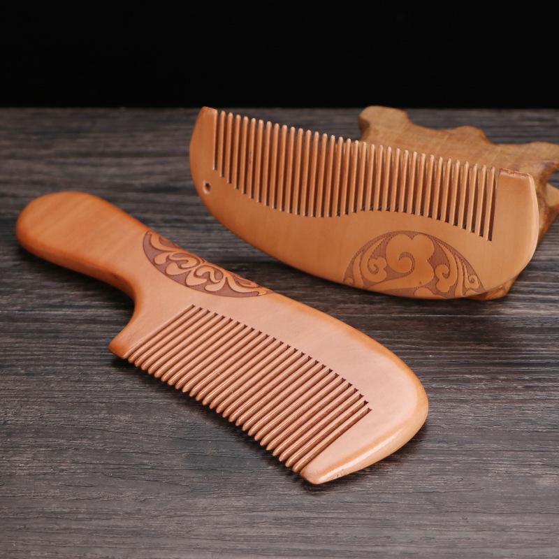 Boutique Peach Wood Comb - Hand-Carved Sandalwood with Auspicious Clouds Design, Personalized Logo Option.