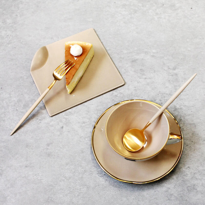 Orphan Ivory Gold Dinner Spoon