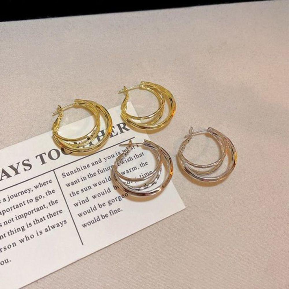 Basic layered hoop earrings are a must-have for casual style.