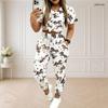 Women Plus Size White Printed Two Piece Set Round Neck Short Sleeve Top Drawstring Cuffed Pants With Pockets