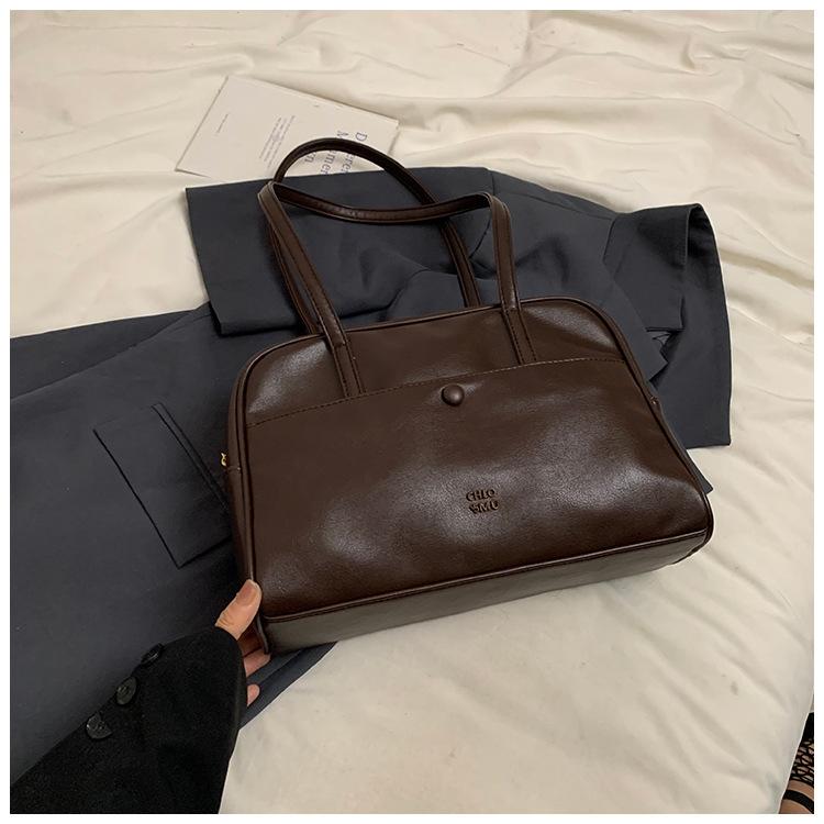 

Korean version pillow bag women s 2025 autumn new retro shoulder bag commuting to work portable large-capacity tote bag