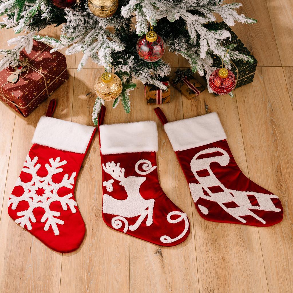 Christmas Beautifully Crafted Stockings With Soft Fabric And Playful Reindeer And Snowflake Themes