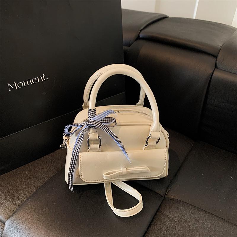 New women's bags trendy and versatile solid color small shell bags portable shoulder oblique span bags