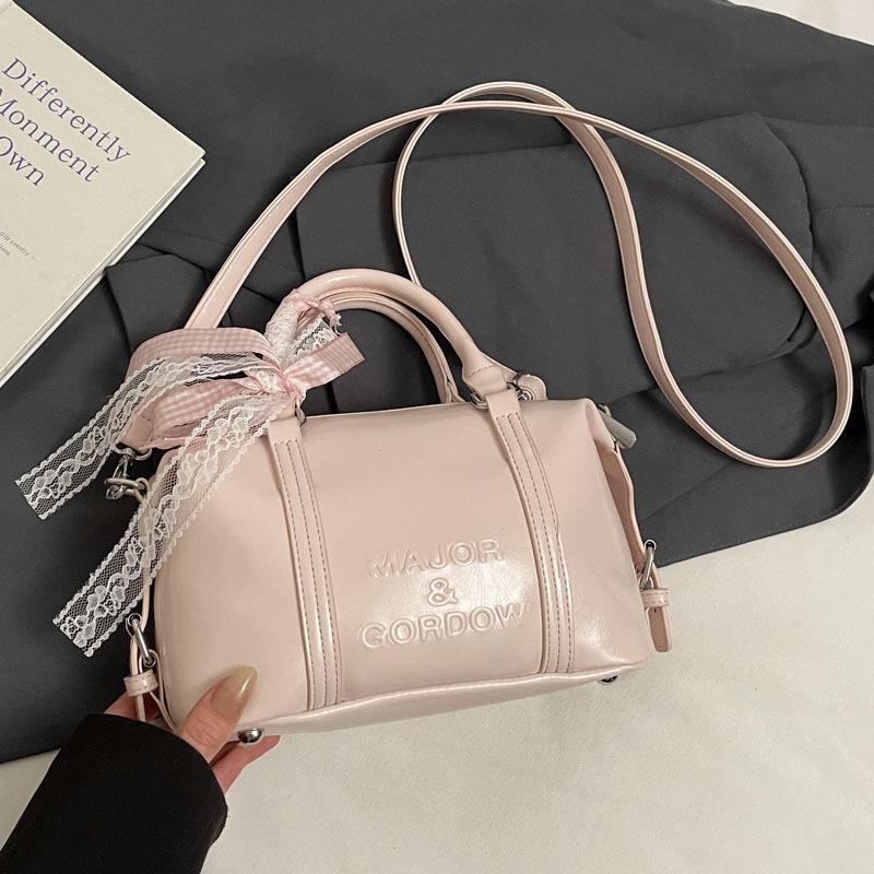 Fashion niche hand carry bowling bag women 2025 new Korean version trend high-end shoulder bag versatile messenger bag